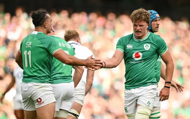 Ireland's Cian Prendergast and James Lowe in action against England