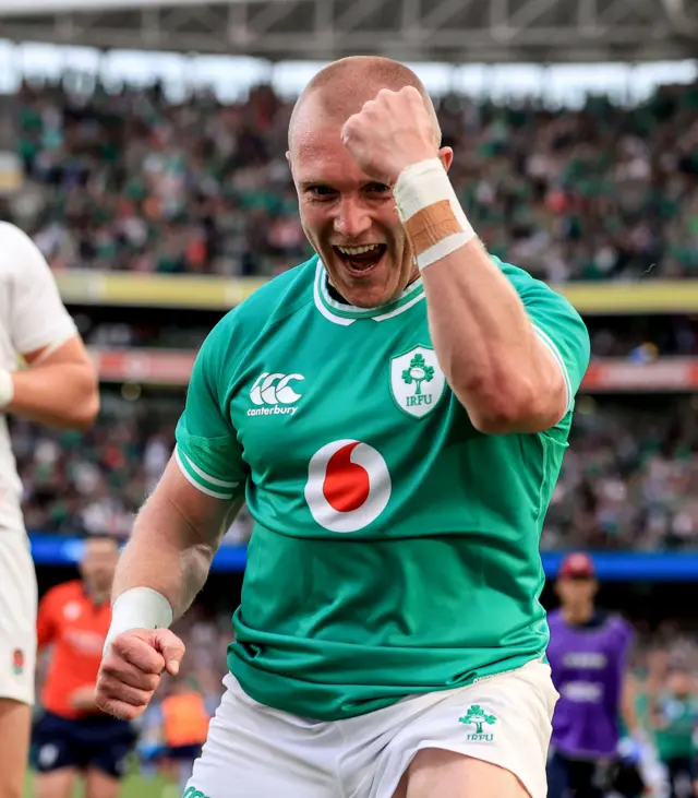 Keith Earls celebrates scoring a try