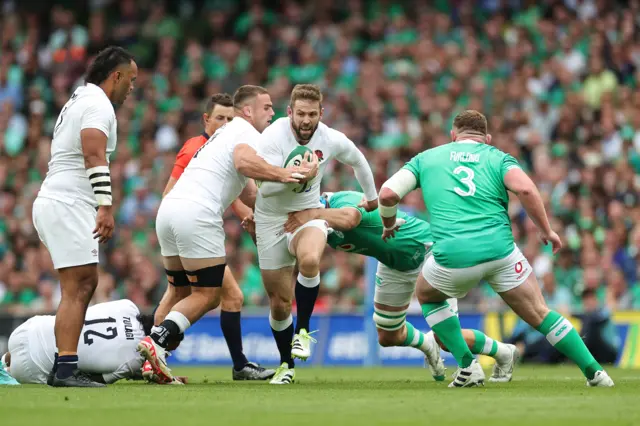 Elliot Daly of England charges upfield during the International match between Ireland and England