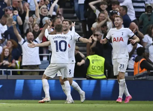 Ben Davies is congratlated by Maddison and Kulusevski.