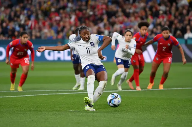 Kadidiatou Diani of France scores her team's fifth goal from the penalty spot