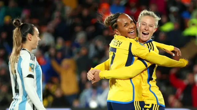 Rebecka Blomqvist (right) celebrates scoring against Argentina