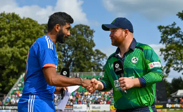 The captains at the toss