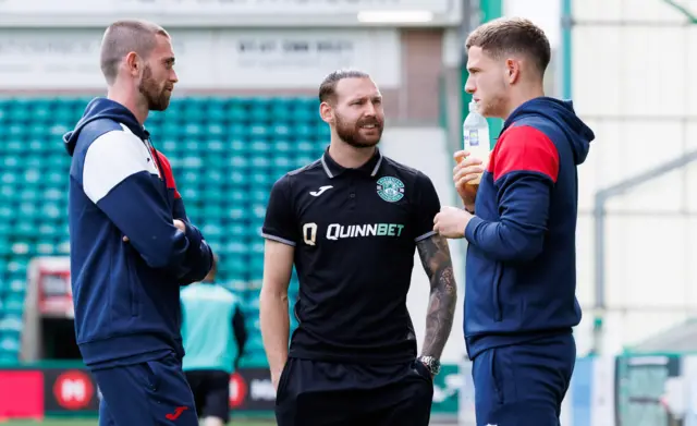 Raith Rovers' Sam Stanton and Jamie Gullan with Hibernian's Martin Boyle (centre)