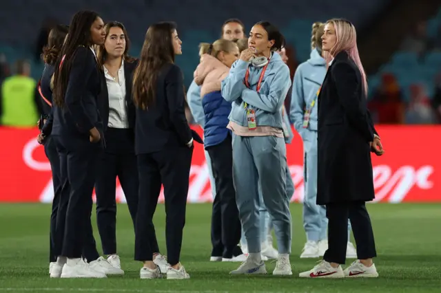 Lucy Bronze stands with her Barcelona club mates before the game.