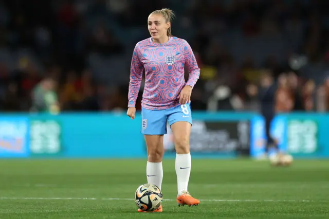 Stanway stands with the ball at her feet during the warm up.