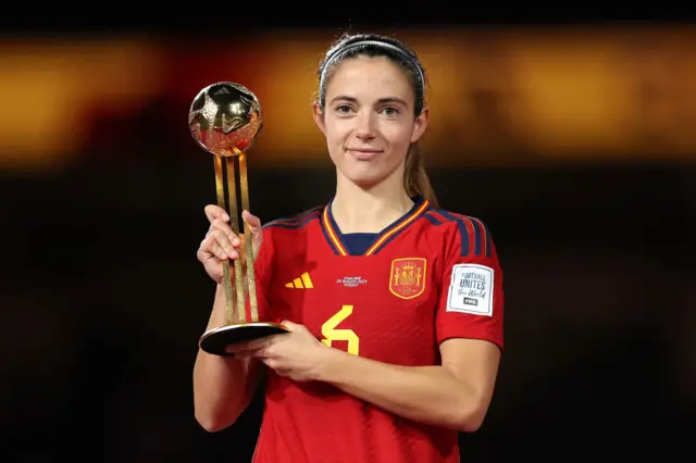 Aitana Bonmati poses with the player of the tournament trophy.