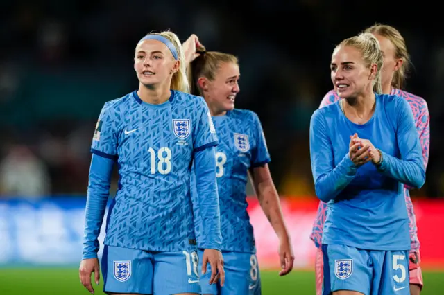 Kelly and Greenwood applaud the fans after the win over Australia.