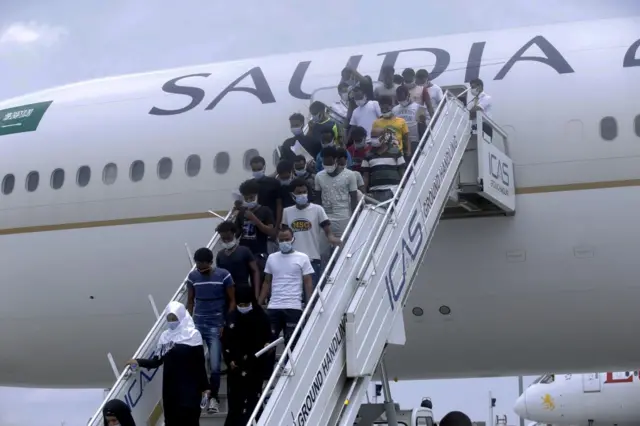 Ethiopian migrants stranded in Saudi Arabia being brought back to Bole International Airport in Addis Ababa, Ethiopia on July 07, 2021.