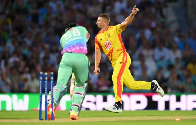 Daniel Sams celebrates the wicket of Sam Curran