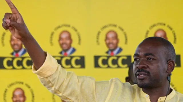 Nelson Chamisa in front of a Citizens Coalition for Change party banner