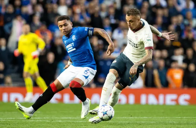 Tavernier and Lang tussle for the ball