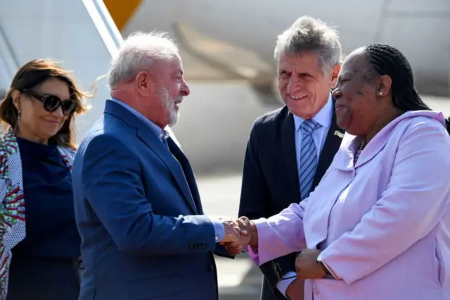 Naledi Pandor, South Africa's foreign minister, greets President Lula of Brazil.