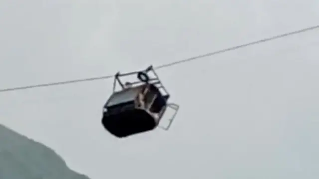 The cable car hanging on by one rope