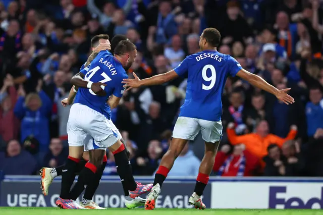 Rangers players celebrate Sima's stunner