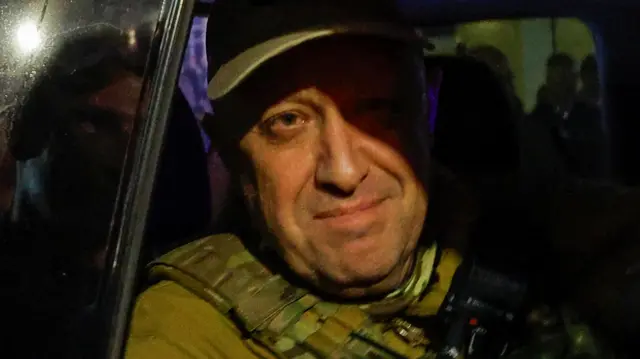 Wagner mercenary chief Yevgeny Prigozhin leaves the headquarters of the Southern Military District amid the group's pullout from the city of Rostov-on-Don, Russia, June 24, 2023