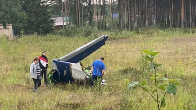 Still showing plane wreckage near Kuzhenkino, Tver Oblast, Russia