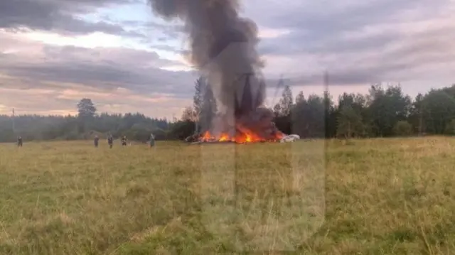 A view shows plane wreckage on fire following an alleged air accident at a location given as Tver region, Russia, in this image published August 23, 2023.