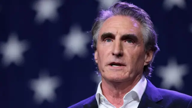 North Dakota Governor and Republican presidential candidate Doug Burgum speaks at the Republican Party of Iowa's Lincoln Day Dinner in Des Moines, Iowa,