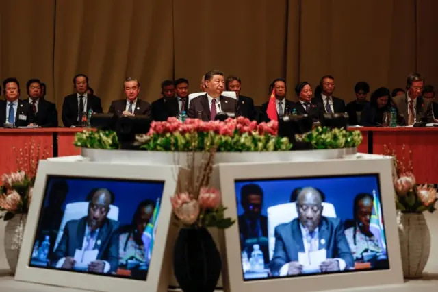 President Xi, behind monitors showing Cyril Ramaphosa, at the Brics summit