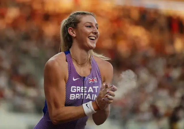 Molly Caudery smiles in celebration during the women's pole vault event