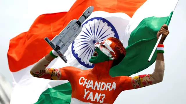 An Indian with his body painted in tri-colours celebrates Chandrayaan-3 spacecraft