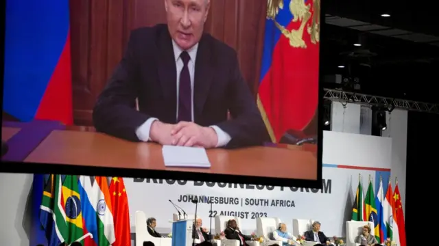 Recorded message from Russian president Vladimir Putin is aired during the opening remarks at the Brics Summit in Johannesburg, South Africa - 22 August 2023