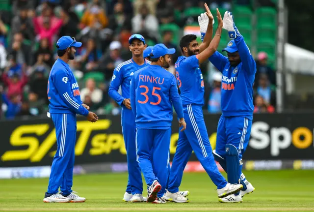 Jasprit Bumrah celebrates taking the wicket of Andrew Balbirnie