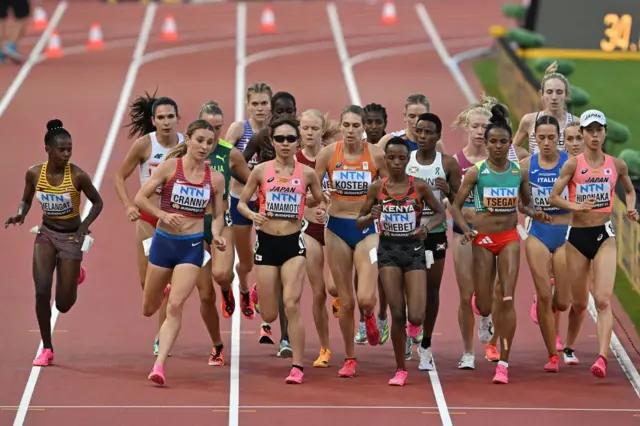 Athletes compete in Heat 1 of the 5000m event at the 2023 World Athletics Championships in Budapest, Hungary