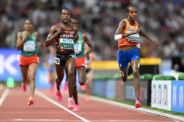 Faith Kipyegon and Sifan Hassan run in the 5,000m heats