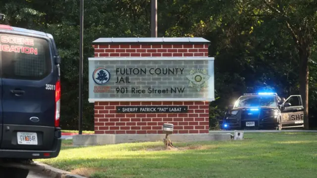 A police car arrives at the Fulton County Jail in Atlanta, Georgia, U.S., August 23, 2023.