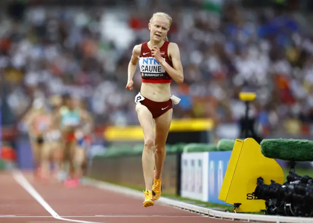 Agata Caune running on track in the Women's 5000m heats at the 2023 World Championships in Budapest, Hungary.