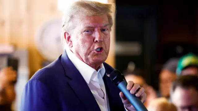 Republican presidential candidate and former U.S. President Donald Trump speaks as he campaigns at the Iowa State Fair in Des Moines, Iowa, U.S. August 12, 2023.