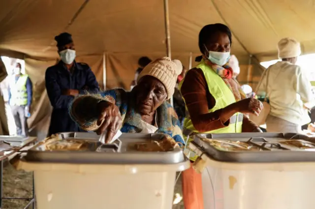 A woman casts her ballot at a polling station during the presidential and legislative elections in Mbare, Harare, on August 23, 2023.