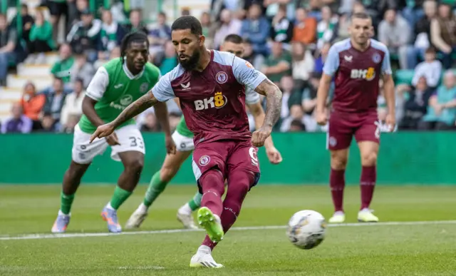 Douglas Luiz scores from the spot