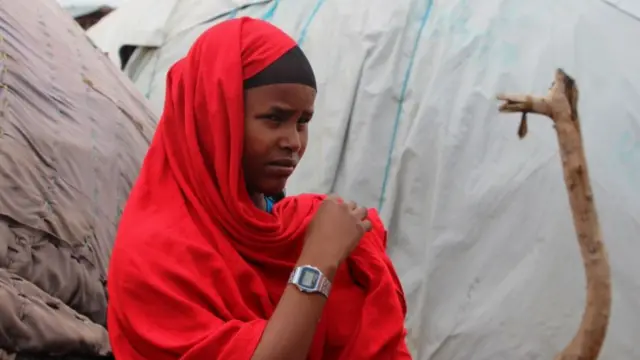 Families at Qoloji IDP camp, the largest camp in Ethiopia housing more than 100,000 displaced individuals - July 2023