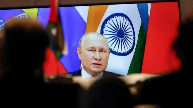 Russia’s President Vladimir Putin on a screen addressing Brics leaders - 24 August 2023