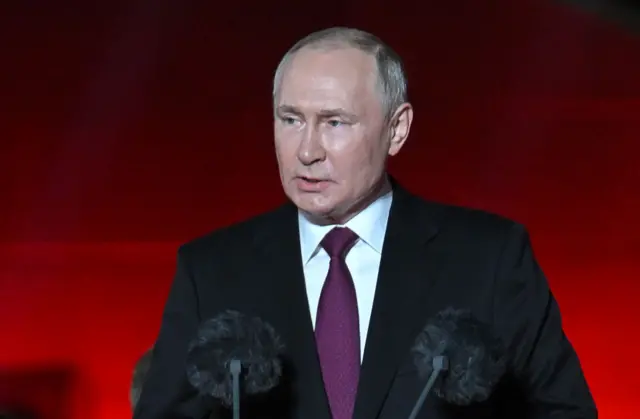 Vladimir Putin at a memorial event in Kursk