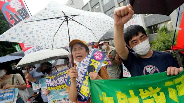 Protestors rally outside Prime Minister Fumio Kishida's official residence