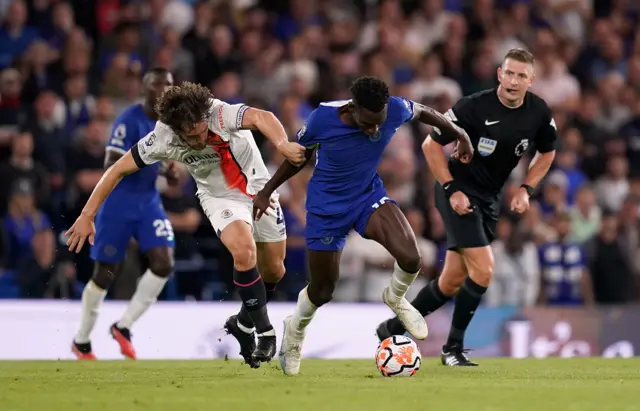 Chelsea striker Nicolas Jackson battles for the ball