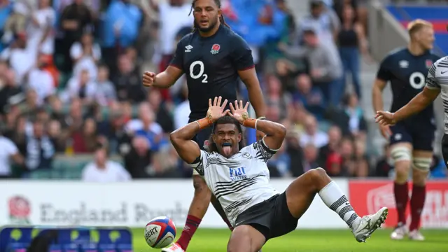 Fiji celebrate scoring a try