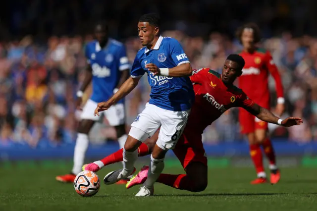 Lewis Dobbin of Everton is fouled by Nelson Semedo of Wolverhampton Wanderers during the Premier League match between Everton FC and Wolverhampton Wanderers at Goodison Park on August 26, 2023