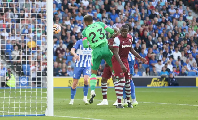 Areola drops the ball in his own box under pressure from Brighton attackers.