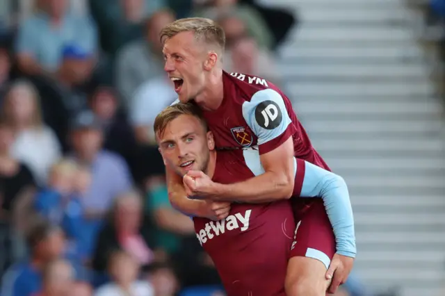 James Ward-Prowse celebrates with Jarrod Bowen after the latter's goal for West Ham against Brighton in the Premier League