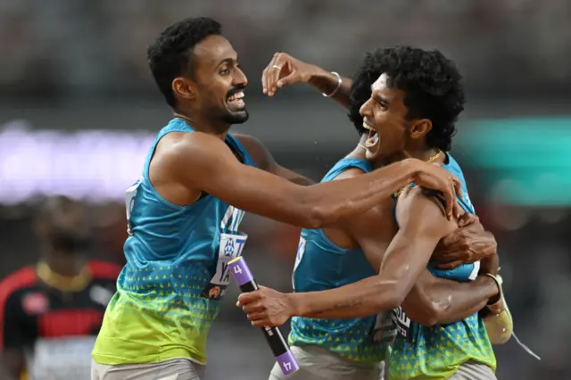 India's 4x400m relay team hug each other in celebration