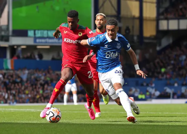 Wolverhampton Wanderers' Nelson Semedo in action with Everton's Lewis Dobbin