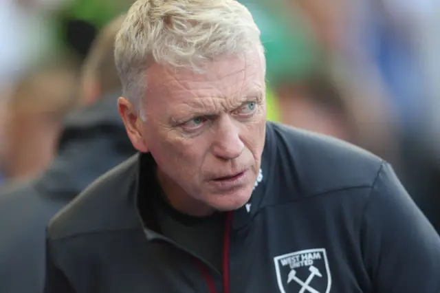 David Moyes ducks his head while looking confused.