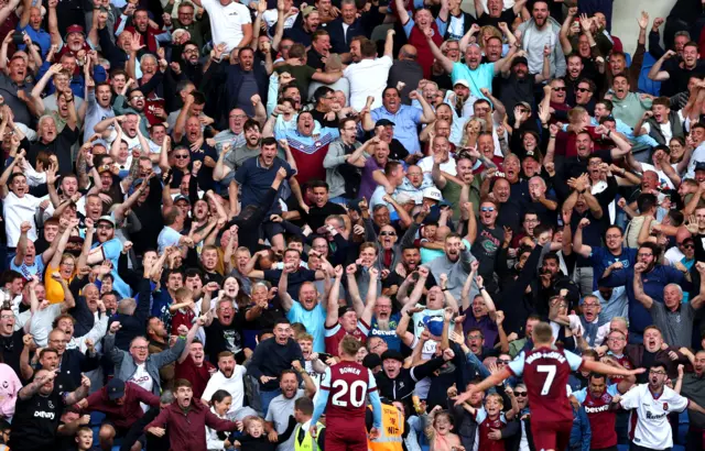 Bowen cleebrates in front of the west ham fans.