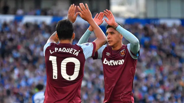 Lucas Paqueta and Edson Alvarez celebrate West Ham's Premier League win at Brighton