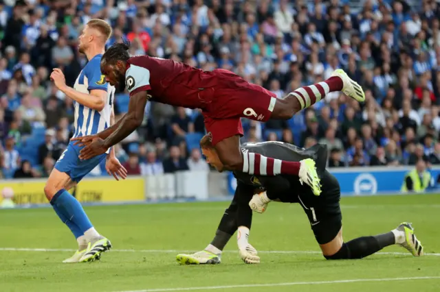 West Ham's Michail Antonio evades a challenge from the Brighton goalkeeper during the sides' Premier League game at Amex Stadium